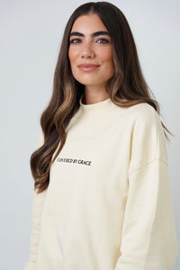 'Covered By Grace'  Mock Neck Sweater in Alabaster